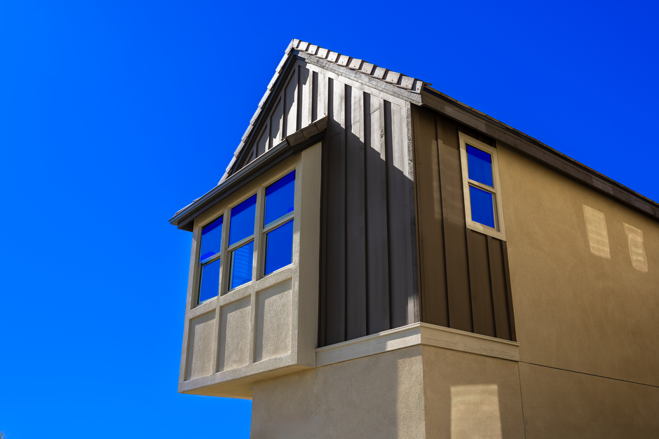 Low Angle Shot of a Building on the Background of a Blue Sky